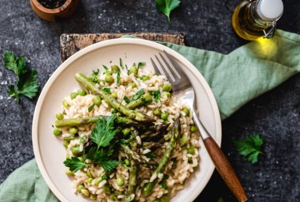 Risotto with asparagus and black garlic